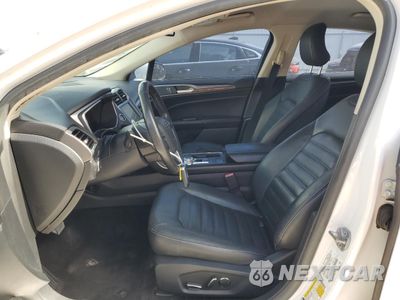 Zdjęcie 7 z 12 samochodu: 2018 FORD FUSION SE HYBRID VIN:3FA6P0LU8JR129888 - miniatura