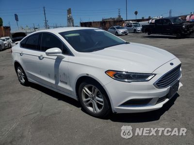 Czwarte zdjęcie samochodu z boku: 2018 FORD FUSION SE HYBRID VIN:3FA6P0LU2JR118675 - miniatura