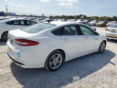 Trzecie zdjęcie samochodu z tyłu: 2018 FORD FUSION SE HYBRID VIN:3FA6P0LU6JR118808 - miniatura