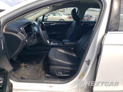 Zdjęcie 7 z 12 samochodu: 2017 FORD FUSION SE HYBRID VIN:3FA6P0LU8HR409417 - miniatura