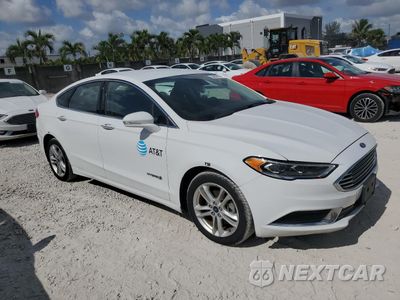 Czwarte zdjęcie samochodu z boku: 2018 FORD FUSION SE HYBRID VIN:3FA6P0LU0JR118612 - miniatura