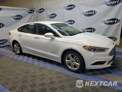 Czwarte zdjęcie samochodu z boku: 2018 FORD FUSION SE HYBRID VIN:3FA6P0LU5JR171791 - miniatura