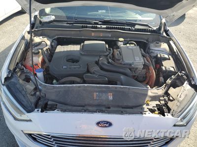 Zdjęcie 11 z 13 samochodu: 2018 FORD FUSION SE HYBRID VIN:3FA6P0LU7JR152451 - miniatura