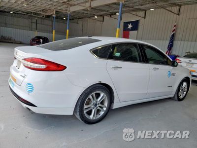 Trzecie zdjęcie samochodu z tyłu: 2018 FORD FUSION SE HYBRID VIN:3FA6P0LU2JR171893 - miniatura