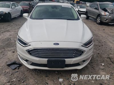 Piąte zdjęcie samochodu w środku: 2017 FORD FUSION SE HYBRID VIN:3FA6P0LU4HR409513 - miniatura