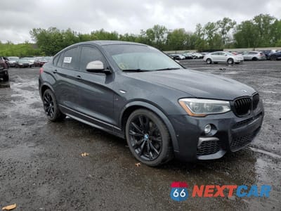 Czwarte zdjęcie samochodu z boku: 2016 BMW X4 XDRIVEM40I VIN:5UXXW7C55G0M91168 - miniatura