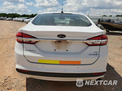 Zdjęcie 6 z 12 samochodu: 2017 FORD FUSION SE HYBRID VIN:3FA6P0LU8HR409630 - miniatura