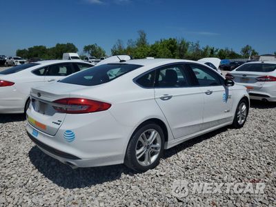 Trzecie zdjęcie samochodu z tyłu: 2018 FORD FUSION SE HYBRID VIN:3FA6P0LU9JR118611 - miniatura
