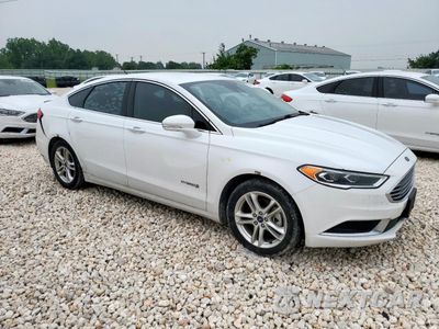 Czwarte zdjęcie samochodu z boku: 2018 FORD FUSION SE HYBRID VIN:3FA6P0LU5JR171810 - miniatura
