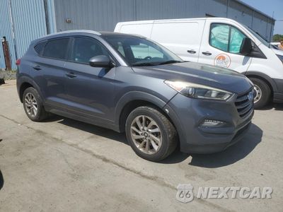 Czwarte zdjęcie samochodu z boku: 2016 HYUNDAI TUCSON LIMITED VIN:KM8J33A42GU084321 - miniatura