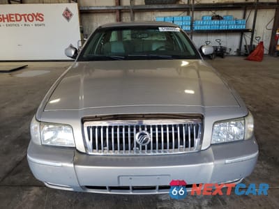 Piąte zdjęcie samochodu w środku: 2010 MERCURY GRAND MARQUIS LS VIN:2MEBM7FV9AX622090 - miniatura