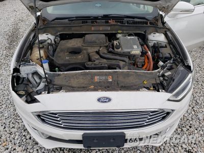 Zdjęcie 11 z 12 samochodu: 2017 FORD FUSION SE HYBRID VIN:3FA6P0LU2HR409641 - miniatura