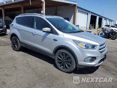 Czwarte zdjęcie samochodu z boku: 2018 FORD ESCAPE TITANIUM VIN:1FMCU9J94JUC61995 - miniatura