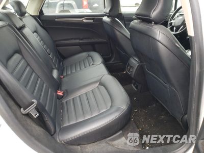Zdjęcie 10 z 12 samochodu: 2018 FORD FUSION SE HYBRID VIN:3FA6P0LU5JR129900 - miniatura