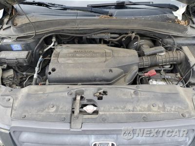 Zdjęcie 12 z 13 samochodu: 2004 HONDA PILOT EXL VIN:2HKYF18624H613407 - miniatura