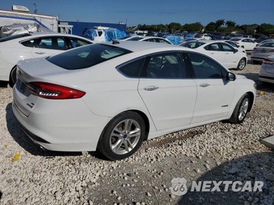 Trzecie zdjęcie samochodu z tyłu: 2018 FORD FUSION SE HYBRID VIN:3FA6P0LU4JR171992 - miniatura