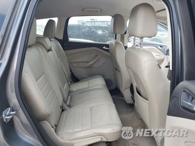 Zdjęcie 11 z 15 samochodu: 2014 FORD ESCAPE TITANIUM VIN:1FMCU0J98EUE55110 - miniatura