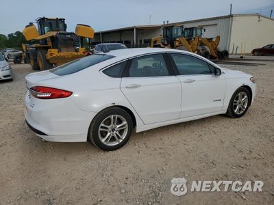 Trzecie zdjęcie samochodu z tyłu: 2018 FORD FUSION SE HYBRID VIN:3FA6P0LU5JR171998 - miniatura