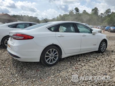 Trzecie zdjęcie samochodu z tyłu: 2017 FORD FUSION SE HYBRID VIN:3FA6P0LU9HR409426 - miniatura