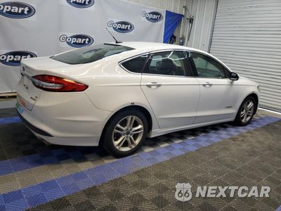 Trzecie zdjęcie samochodu z tyłu: 2018 FORD FUSION SE HYBRID VIN:3FA6P0LU5JR171791 - miniatura