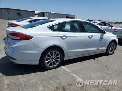 Trzecie zdjęcie samochodu z tyłu: 2017 FORD FUSION SE HYBRID VIN:3FA6P0LU4HR409205 - miniatura