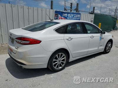 Trzecie zdjęcie samochodu z tyłu: 2017 FORD FUSION SE HYBRID VIN:3FA6P0LU4HR359650 - miniatura