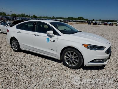 Czwarte zdjęcie samochodu z boku: 2017 FORD FUSION SE HYBRID VIN:3FA6P0LU4HR409074 - miniatura