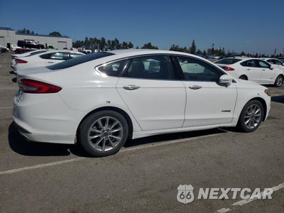 Trzecie zdjęcie samochodu z tyłu: 2017 FORD FUSION SE HYBRID VIN:3FA6P0LU7HR409733 - miniatura