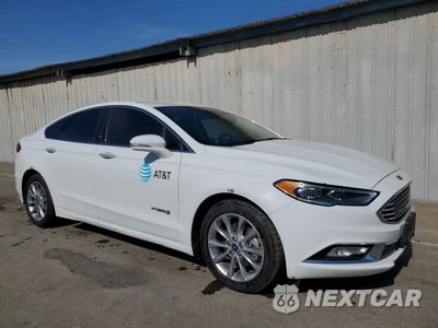 Czwarte zdjęcie samochodu z boku: 2017 FORD FUSION SE HYBRID VIN:3FA6P0LU9HR409197 - miniatura