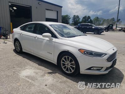 Czwarte zdjęcie samochodu z boku: 2017 FORD FUSION SE HYBRID VIN:3FA6P0LU5HR359589 - miniatura