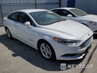 Czwarte zdjęcie samochodu z boku: 2018 FORD FUSION SE HYBRID VIN:3FA6P0LU6JR198322 - miniatura
