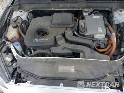 Zdjęcie 11 z 12 samochodu: 2017 FORD FUSION SE HYBRID VIN:3FA6P0LU3HR359641 - miniatura