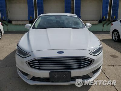 Piąte zdjęcie samochodu w środku: 2018 FORD FUSION SE HYBRID VIN:3FA6P0LU3JR118829 - miniatura