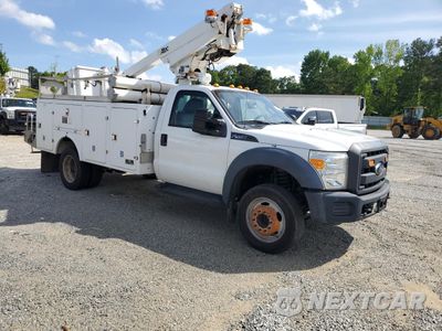 Czwarte zdjęcie samochodu z boku: 2015 FORD F450 SUPER DUTY VIN:1FDUF4GYXFEA65867 - miniatura