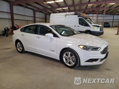 Czwarte zdjęcie samochodu z boku: 2018 FORD FUSION SE HYBRID VIN:3FA6P0LUXJR281882 - miniatura