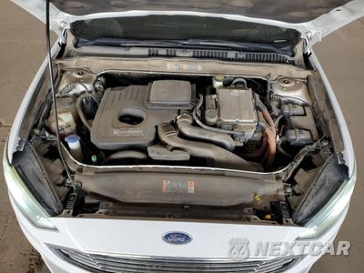 Zdjęcie 11 z 12 samochodu: 2017 FORD FUSION SE HYBRID VIN:3FA6P0LU5HR409133 - miniatura