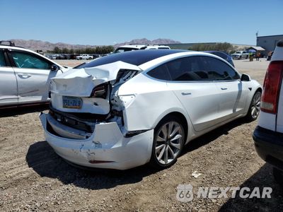 Trzecie zdjęcie samochodu z tyłu: 2018 TESLA MODEL 3 VIN:5YJ3E1EA2JF042467 - miniatura
