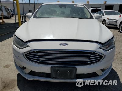 Piąte zdjęcie samochodu w środku: 2017 FORD FUSION SE HYBRID VIN:3FA6P0LU7HR409375 - miniatura