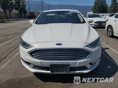 Piąte zdjęcie samochodu w środku: 2017 FORD FUSION SE HYBRID VIN:3FA6P0LU7HR409330 - miniatura