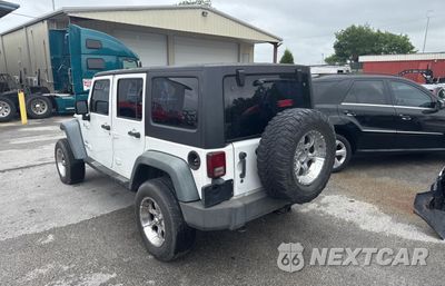 Trzecie zdjęcie samochodu z tyłu: 2013 JEEP WRANGLER UNLIMITED SPORT VIN:1C4BJWDG6DL582321 - miniatura