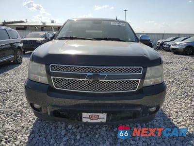 Piąte zdjęcie samochodu w środku: 2010 CHEVROLET SUBURBAN K1500 LTZ VIN:1GNUKKE38AR179628 - miniatura