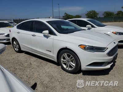 Czwarte zdjęcie samochodu z boku: 2018 FORD FUSION SE HYBRID VIN:3FA6P0LU7JR278616 - miniatura