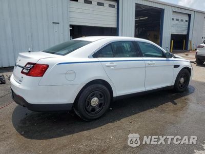 Trzecie zdjęcie samochodu z tyłu: 2014 FORD TAURUS POLICE INTERCEPTOR VIN:1FAHP2MK3EG122006 - miniatura