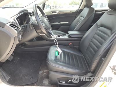 Zdjęcie 7 z 12 samochodu: 2018 FORD FUSION SE HYBRID VIN:3FA6P0LU6JR118713 - miniatura