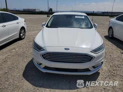 Piąte zdjęcie samochodu w środku: 2017 FORD FUSION SE HYBRID VIN:3FA6P0LU9HR409314 - miniatura