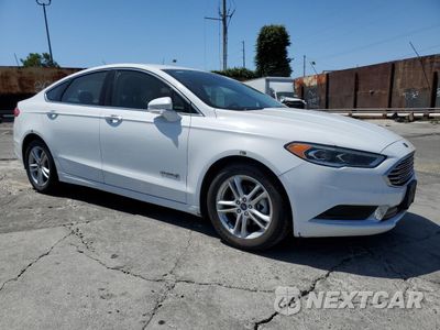 Czwarte zdjęcie samochodu z boku: 2018 FORD FUSION SE HYBRID VIN:3FA6P0LU8JR172112 - miniatura