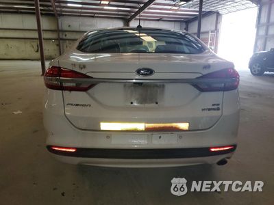 Zdjęcie 6 z 12 samochodu: 2018 FORD FUSION SE HYBRID VIN:3FA6P0LU1JR129943 - miniatura