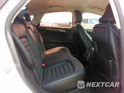 Zdjęcie 10 z 13 samochodu: 2017 FORD FUSION SE HYBRID VIN:3FA6P0LUZHR410061 - miniatura