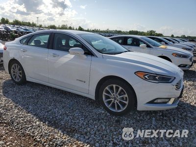 Czwarte zdjęcie samochodu z boku: 2017 FORD FUSION SE HYBRID VIN:3FA6P0LU3HR408935 - miniatura