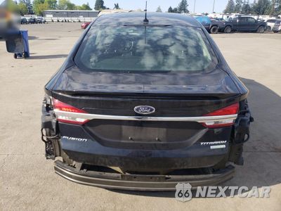 Zdjęcie 6 z 15 samochodu: 2017 FORD FUSION TITANIUM VIN:3FA6P0K92HR111359 - miniatura